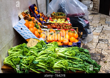 Matera, Italy - March 11, 2019: Fruit and vegetables in a mediterranean street market. Stock Photo