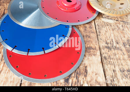 Red diamond wheels for granite and stone, blue for concrete, reinforced concrete, yellow for grinding concrete and stone, silver for cutting ceramic t Stock Photo