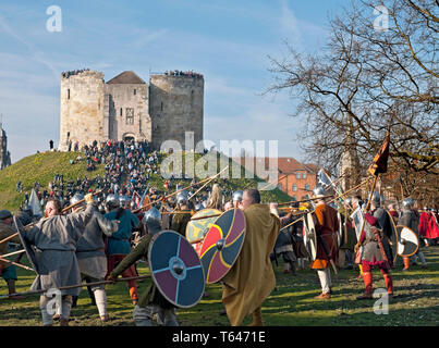 People dressed as Vikings and Anglo Saxon Warriors in combat at the Viking Festival York North Yorkshire England UK United Kingdom GB Great Britain Stock Photo