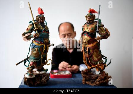 Beijing, China's Hebei Province. 28th Apr, 2019. Chen Hailiang, a dough sculpture artist, makes dough sculpture in Yongqing County, north China's Hebei Province, April 28, 2019. Credit: Wang Xiao/Xinhua/Alamy Live News Stock Photo