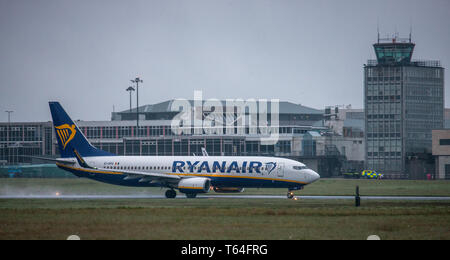 Cork Airport, Cork, Ireland. 29th Apr, 2019. Ryanair Boeing 737 bound for London Stanstead taxiis down the runway on a foggy misty morning at Cork Airport, Cork, Ireland. Credit: David Creedon/Alamy Live News Stock Photo