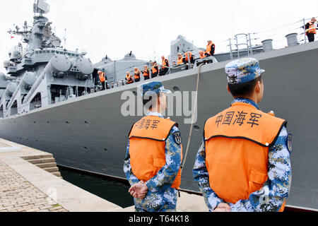 (190429) -- QINGDAO, April 29, 2019 (Xinhua) -- Russian cruiser Varyag arrives at Dagang port of Qingdao, east China's Shandong Province, April 29, 2019. Russian naval vessels arrived in Qingdao on Monday to participate in the Sino-Russian 'Joint Sea-2019' exercise. The exercise will focus on joint sea defense, which aims to consolidate and develop the China-Russia comprehensive strategic partnership of coordination, deepen pragmatic naval cooperation, and improve their capabilities to jointly respond to security threats at sea. Two submarines, 13 surface ships, as well as fixed-wing Stock Photo