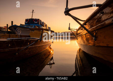 Golden sunset at Waterhead on Lake Windermere in Ambleside, Lake District National Park, Cumbria England UK Stock Photo