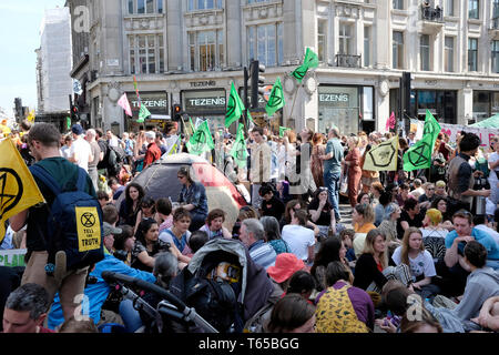 Extinction rebellion environmental activists block Oxford and Regent Street in central London. Stock Photo