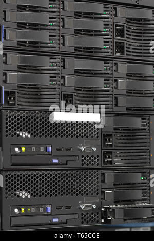 servers stack with hard drives in a datacenter Stock Photo