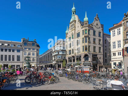 People walking through Amagertorv or Amager Square, a central square in the Stroget pedestrian zone. Copenhagen. Denmark 05/06/2018    Photo Fabio Maz Stock Photo