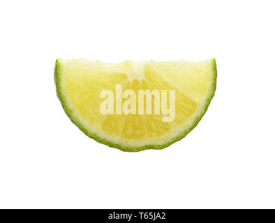 Close up one round thin cut slice of fresh green lime fruit, backlit and isolated on white background Stock Photo