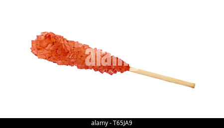 Close up one wooden stick with brown red sugar crystals isolated on white background, elevated top view, directly above Stock Photo