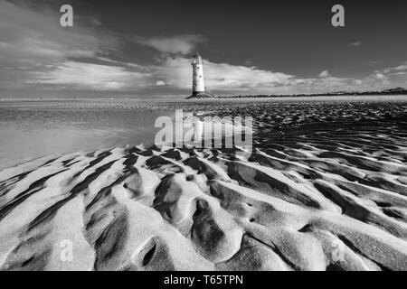 The slightly leaning Talacre Lighthouse and beach near Prestatyn on the North Wales coast Stock Photo