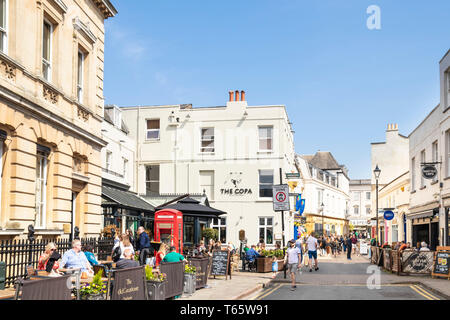 Shops cafes and restaurants on Regent Street Cheltenham Spa Gloucestershire England UK GB Europe Stock Photo