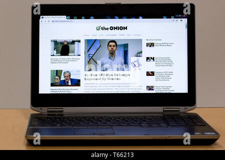 Screen of a laptop computer showing the front page of the Onion online newspaper 3/1/2019 Stock Photo
