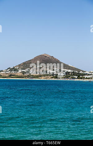 beautiful mountain with ocean in foreground, cloudless sky Stock Photo