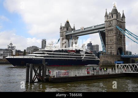 Le Champlain, the second ship of the Ponant Explorers-class of cruise ships operated by Ponant, sails under Tower Bridge in London. Stock Photo