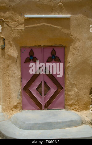 Pretty and colorful doors of traditional Omani houses in the villages of Jebal Akdar, Oman Stock Photo