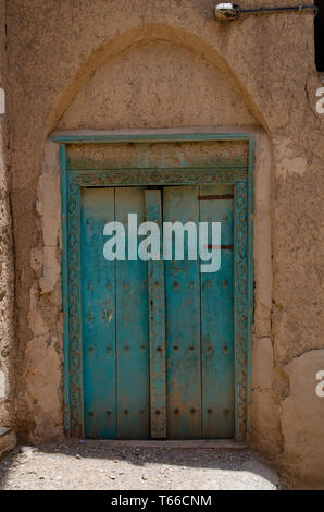 Pretty and colorful doors of traditional Omani houses in the villages of Jebal Akdar, Oman Stock Photo