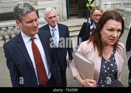 (left to right) Shadow Brexit Secretary Sir Keir Starmer, shadow Chancellor of the Exchequer John McDonnell, shadow business secretary Rebecca Long-Bailey and shadow Environment Secretary Sue Hayman leaving the Cabinet Office in Westminster, London, following the latest round of Brexit talks. Stock Photo