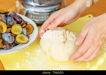 preparing dough for plum cake Stock Photo