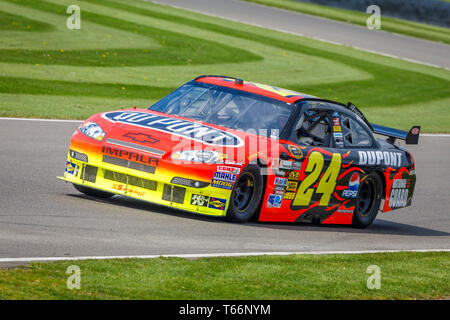 2009 Chevrolet Impala SS NASCAR with driver Mick Strafford during a demonstration run at the 77th Goodwood GRRC Members Meeting, Sussex, UK Stock Photo