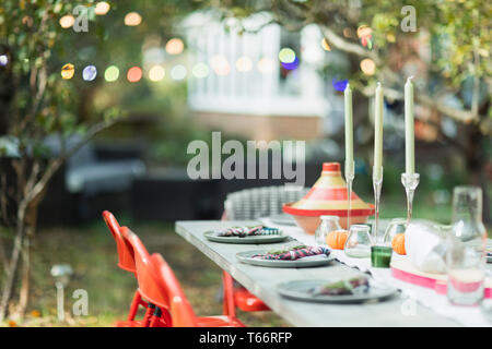 Table set for dinner garden party Stock Photo