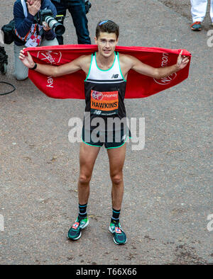 LONDON, ENGLAND - APRIL 28: Callum Hawkins of Scotland celebrating his run in the elite men’s race in the Virgin London Marathon 2019 on April 28, 201 Stock Photo