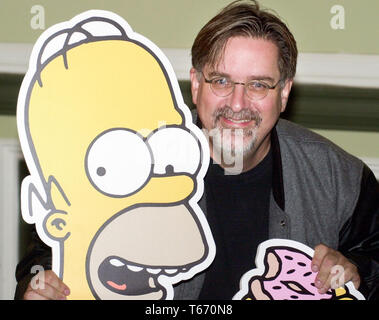 Celebrating ten years of The Simpsons on Sky One, The Simpsons Mania Tour started at The Assembley Rooms in Edinburgh tonight, Monday 14/8/00.  The voices behind the characters performed a rare live read of one of the scripts aided by the series creator Matt Groening. Matt is pictured with his character Homer. Stock Photo