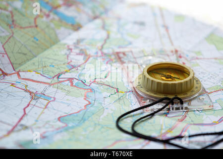 old touristic compass on map Stock Photo