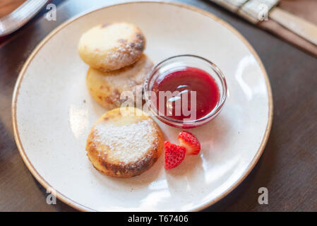 cheese cakes from cottage cheese with jam Stock Photo