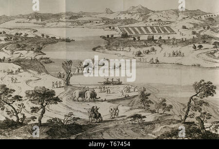 History by Polybius. Volume IV. French edition translated from Greek by Dom Vincent Thuillier. Comments of Military Science enriched with critical and historical notes by M. De Folard. Paris, chez Pierre Gandouin, Julien-Michel Gandouin, Pierre-Francois Giffart and Nicolas-Pierre Armand, 1728. Second Punic War. The Carthaginian army of Hannibal crossing a river over rafts. 3rd century BC. Engraving. Stock Photo