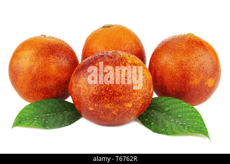 Ripe red blood oranges with green leaves isolated Stock Photo