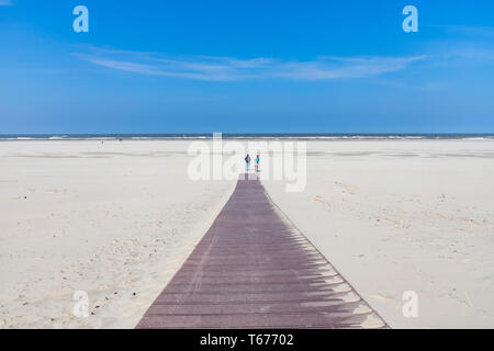 North Sea Island Juist, East Frisia, wooden boardwalk to the beach, Lower Saxony, Germany, Stock Photo