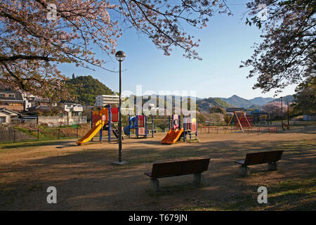 small park and playgound with cherry blossoms in Japan Stock Photo