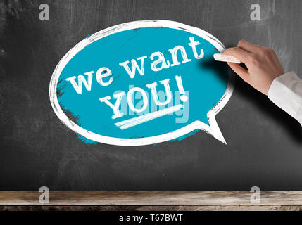 text WE WANT YOU in speech bubble on blackboard recruiting concept Stock Photo