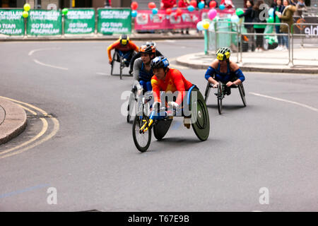 Zou Lihong from Chine competing in the Women's Elite Wheelchair race(T53/T54), during the 2019 London marathon, she went on to finish 6th in  a time of 01:52:10 Stock Photo