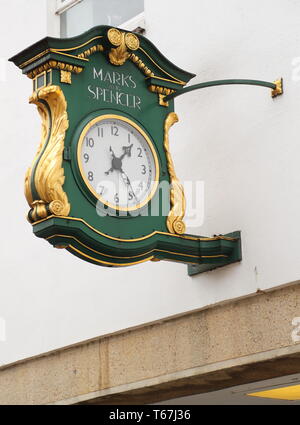 Classic clock above the Marks & Spencer shop in Oxford, UK Stock Photo