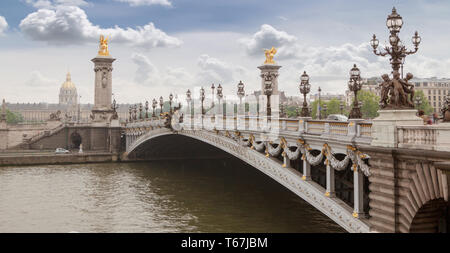 Panorama with Pont Alexandre III Bridge and overlooking the old city, cloudy day. France Paris Stock Photo