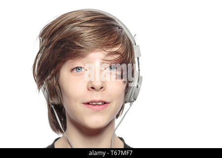 male smiling teenager with headphones, isolated on white Stock Photo