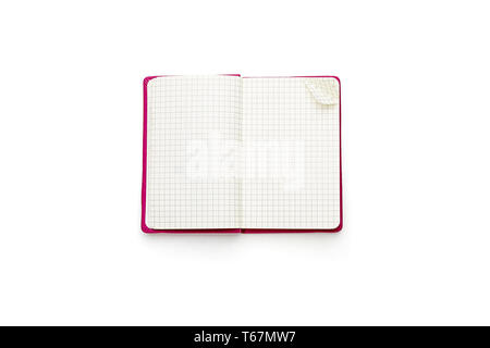 pink blank squared open diary, isolated on white Stock Photo