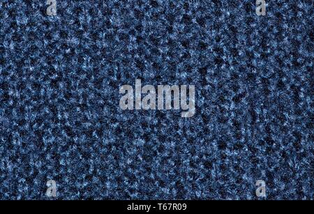 Macro color swatch of a blue woolen cardigan detailing the fine textures in the knit. Stock Photo