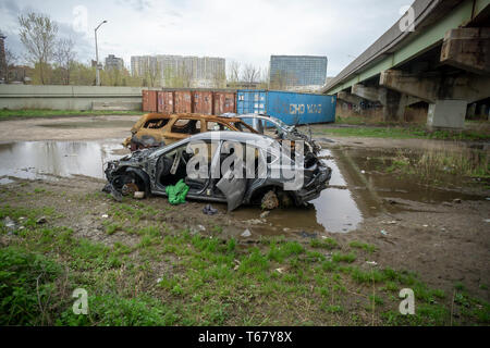 Abandoned vehicles around Flushing Creek in the Flushing neighborhood of Queens in New York on Saturday, April 20, 2019. (Â© Richard B. Levine) Stock Photo