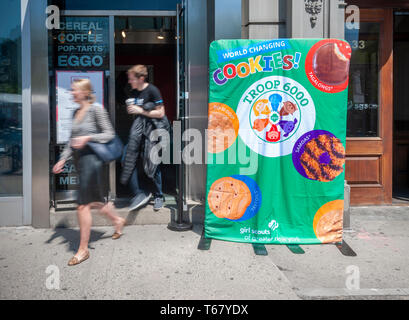 A sign outside the Kelloggâ€™s restaurant in Union Square in New York on Tuesday, April 23, 2019 announces the sale inside of Girl Scout Cookies by Troop 6000, which consists of homeless girls. (Â© Richard B. Levine)