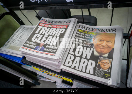 Headlines of the NY Daily News and the NY Post have divergent views on Friday, April 19, 2019 on the previous day’s release of the redacted report by special counsel Robert Mueller on Russian meddling in the presidential election and possible collusion by the Trump campaign and Attorney General William Barr's press conference of the report. (© Richard B. Levine) Stock Photo