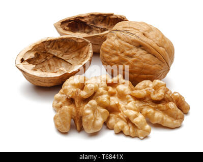Whole and broken walnuts isolated on white background Stock Photo