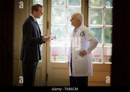 View of a doctor engrossed in a conversation. Stock Photo