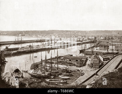 Late 19th Century view of  the crowder harbour of Saint Helier, with sailing ships moored against the quays. Jersey, the largest of the Channel Islands, Crown dependencies, in the English Channel. Stock Photo