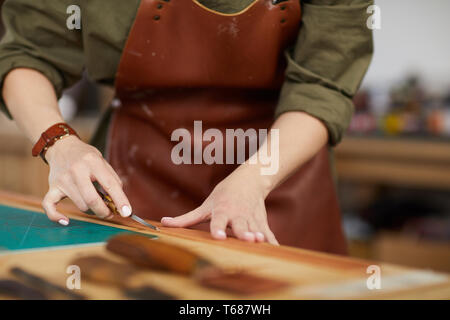 Tanner at Work Stock Photo