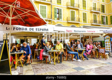 Palma de Mallorca Old Town People in tapas bar on  Plaza Mayor, Placa Major in Palma de Mallorca, Spain Europe Stock Photo