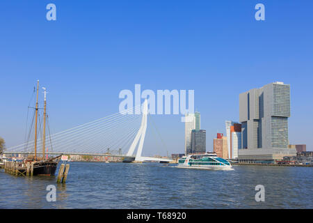 The Abel Tasman river cruise ship sailing past the Erasmus Bridge (1996) on the New Meuse in Rotterdam, Netherlands Stock Photo