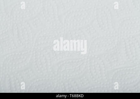 white perforated paper texture or background Stock Photo