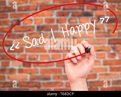 Sad Hand Writing Man Hand writing Sad - Happy with black marker on visual screen Stock ...