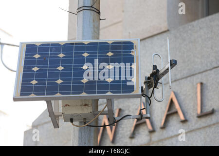 photovoltaic solar energy panel on a lamp post or pole in the city centre of Cape Town concept technology in Africa and sustainable renewable energy Stock Photo